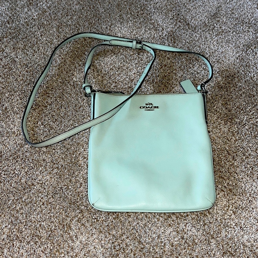 Mint green leather Coach crossbody purse